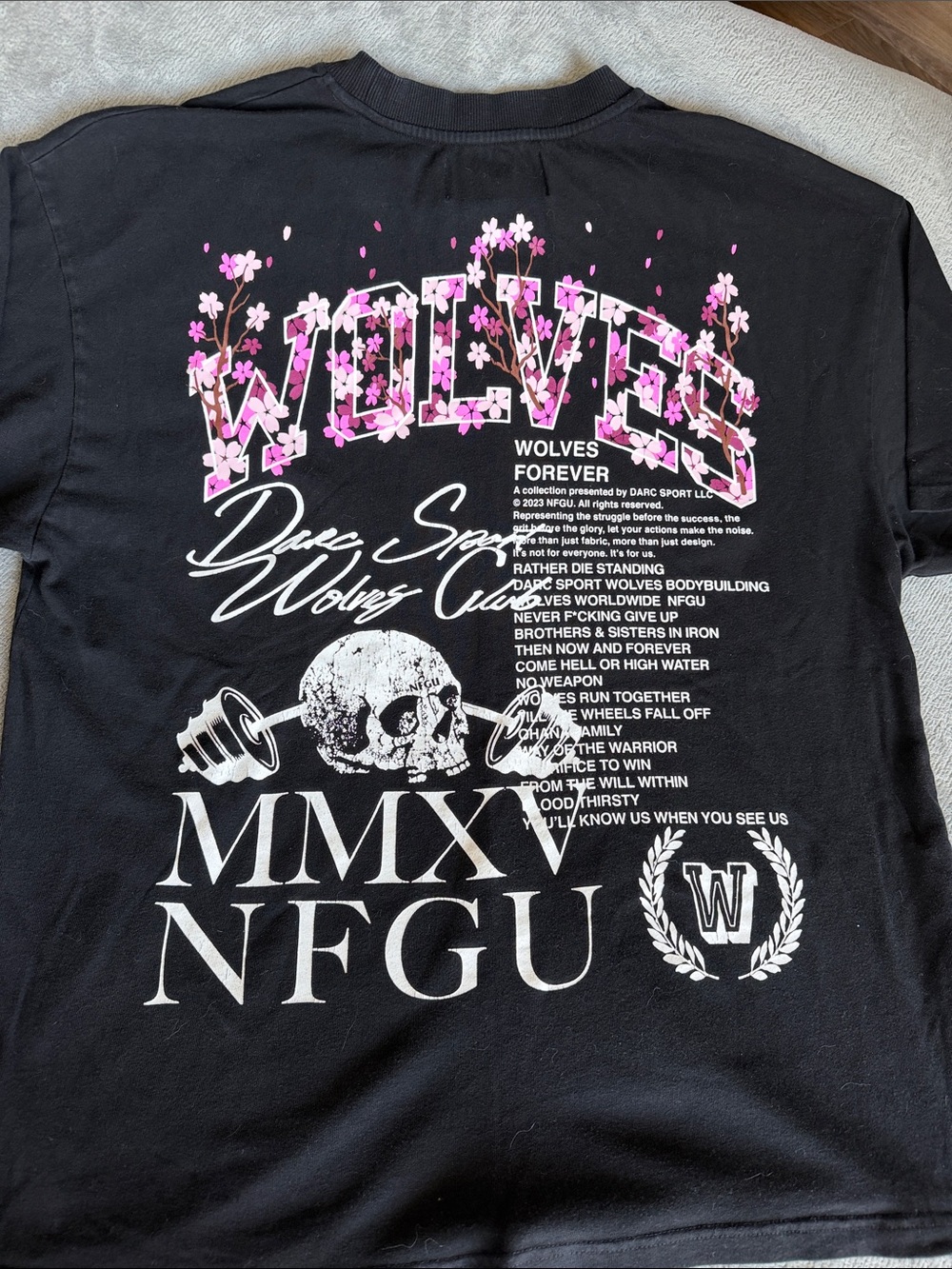 Darc Sport Black Tee with Pink Floral 'WOLVES' Back Graphic